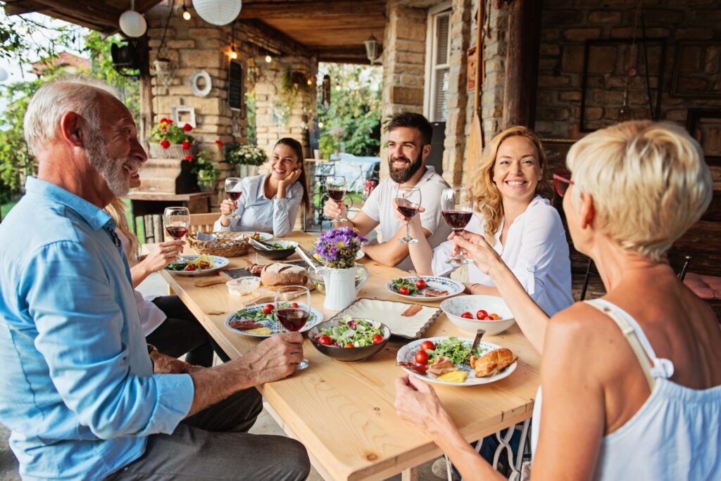 Aerial shot of a group of people dining together.