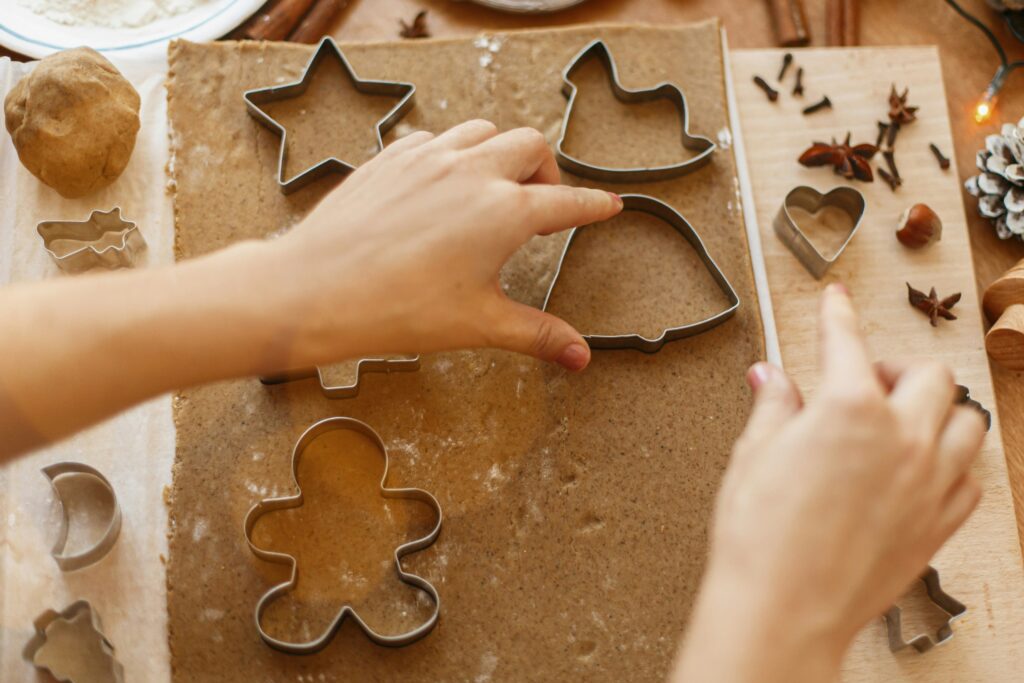 Gingerbread being cut into shapes
