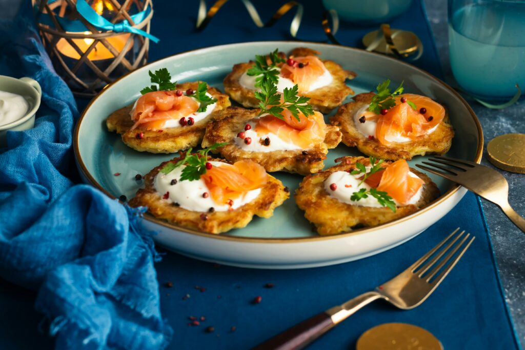 Fried Swedish potato cakes with salmon and herbs
