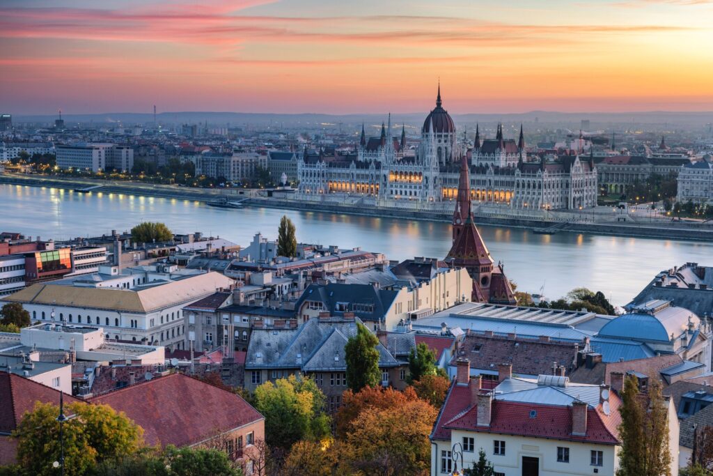 A view of Budapest's parliament and the Danube from the Buda side of the city. It's fall, and the sun is setting.