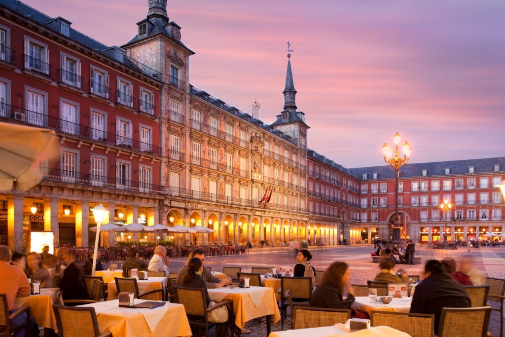 Restaurant tables outside in a plaza in Madrid