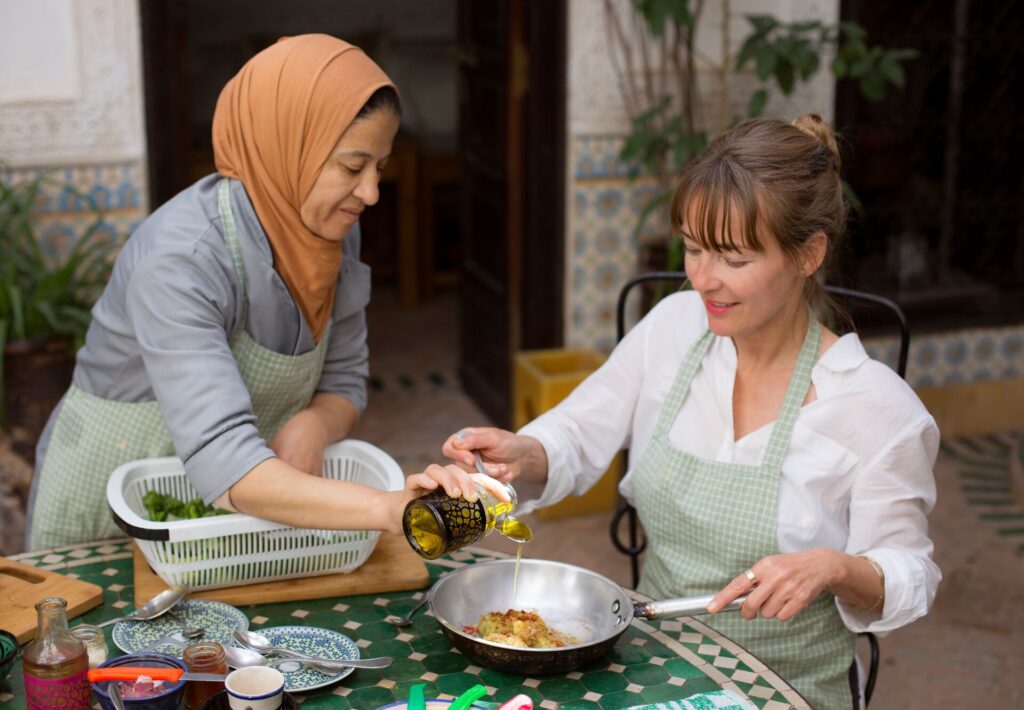 women enjoying a cooking class in morocco