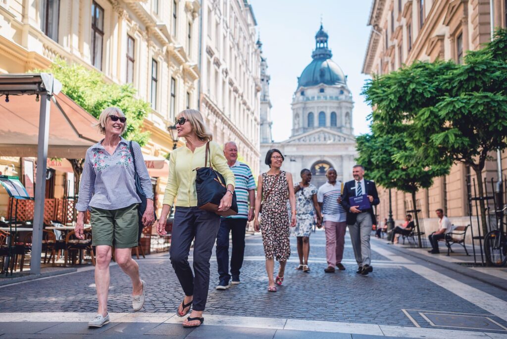 large group of guests walking through budapest, hungary