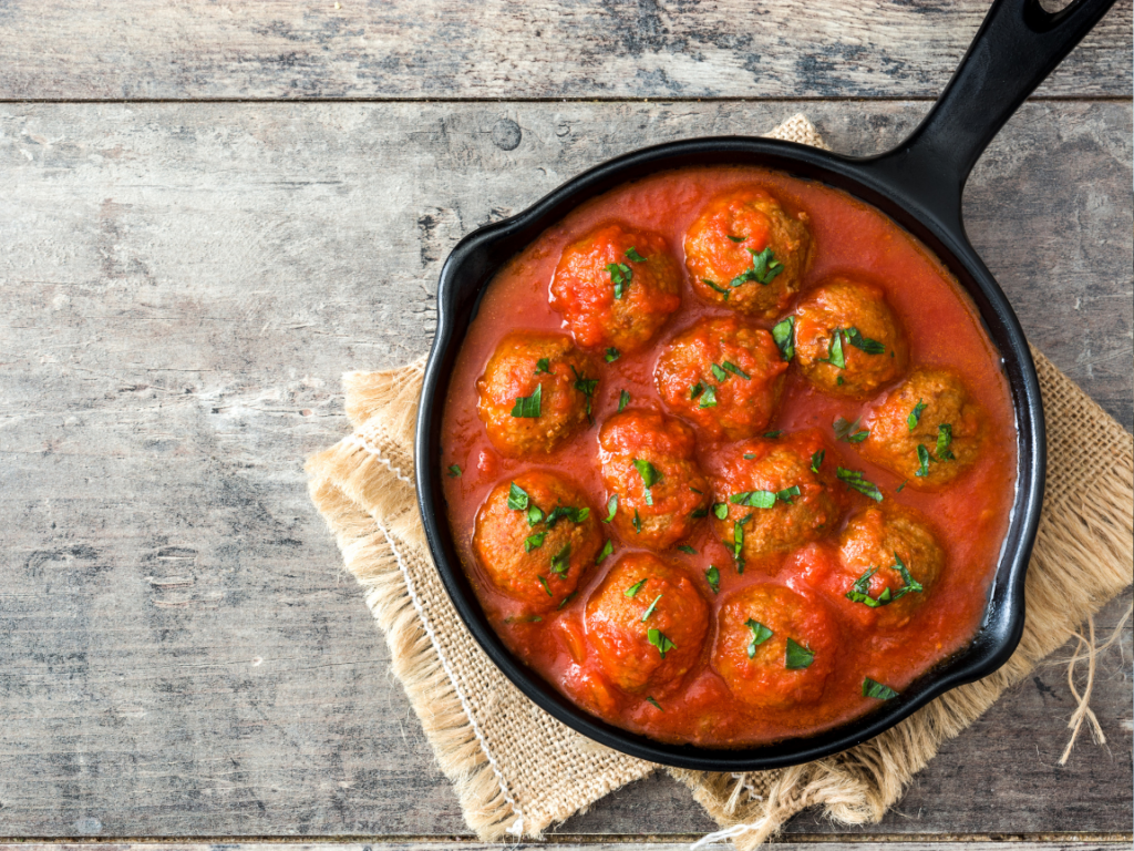 frying pan filled with Albondigas 