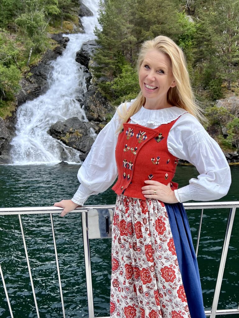 Travel Director Margot in traditions Swedish dress