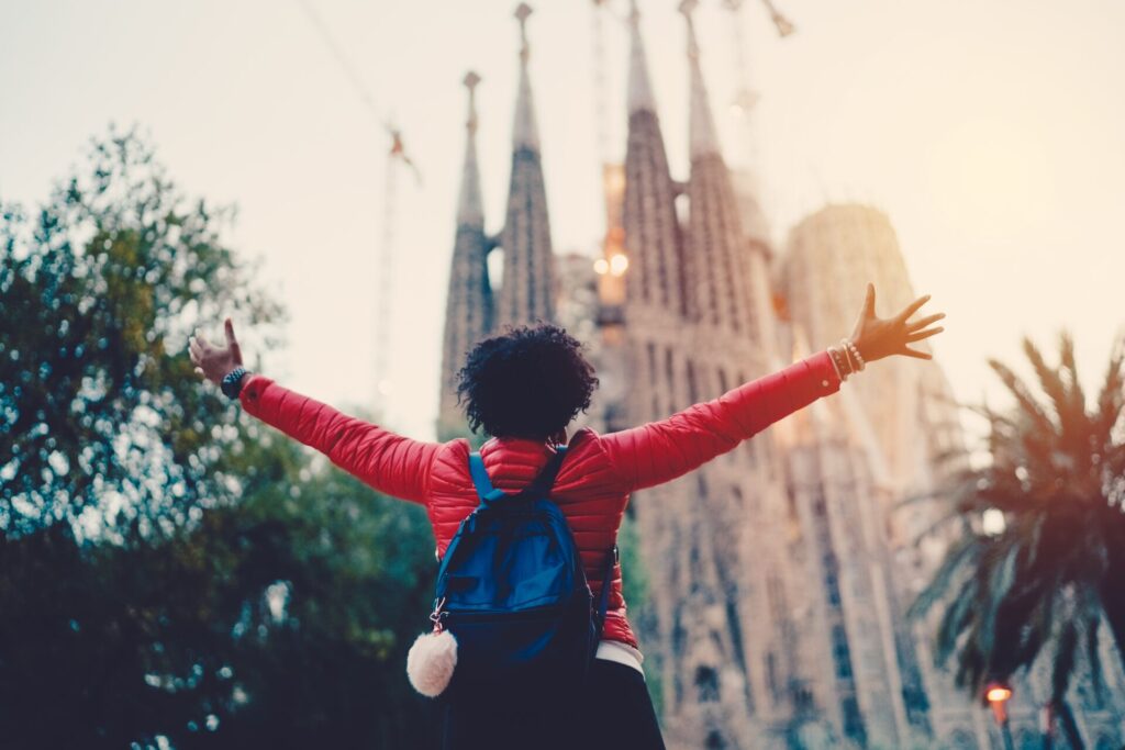 woman cheering at sagrada familia