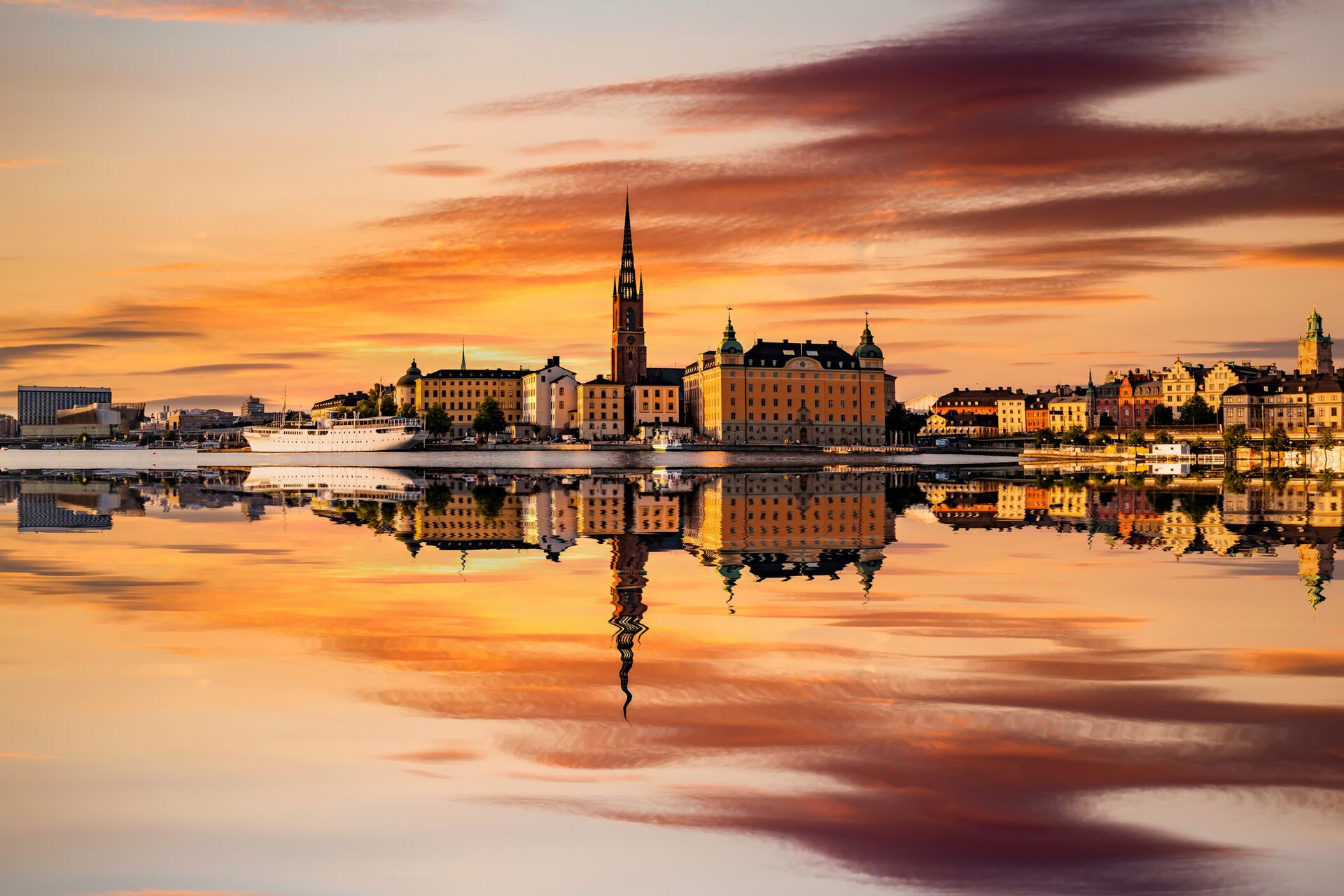 Stockholm at sunset reflected in water