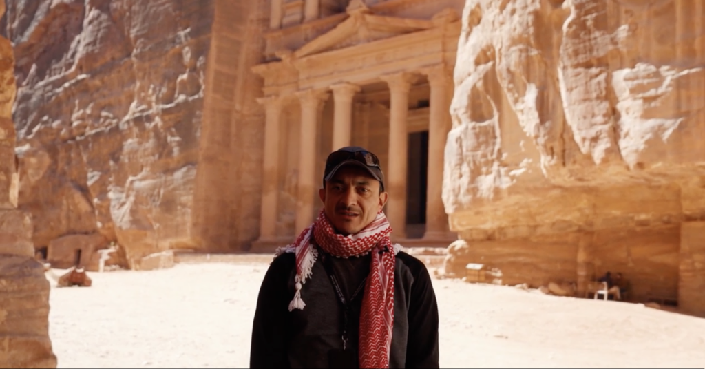 Travel Directo Muhammad in front of Treasury in Petra