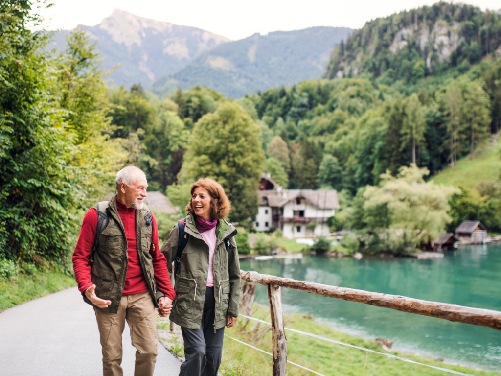 Couple walking along river